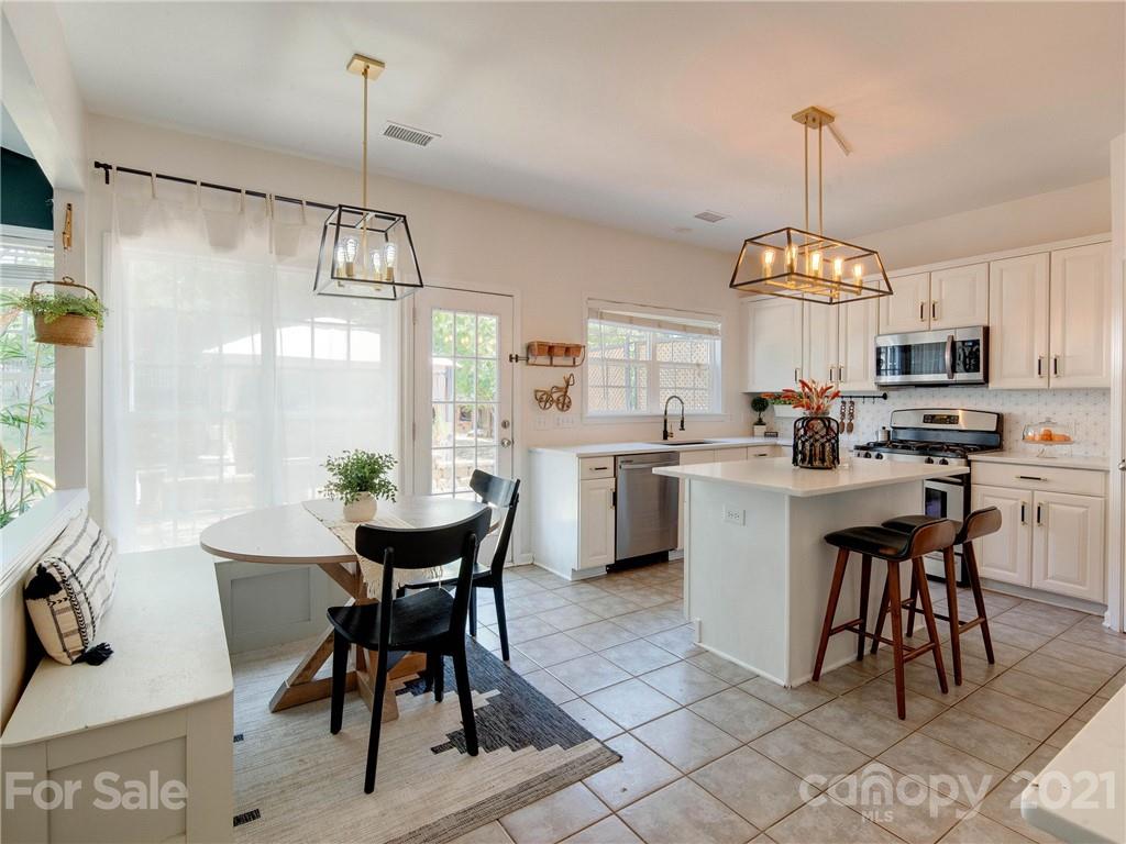 2405 Coltsgate Road Waxhaw, NC 28173 - Photo 20 of 48 a view of a dining room with furniture window and outside view