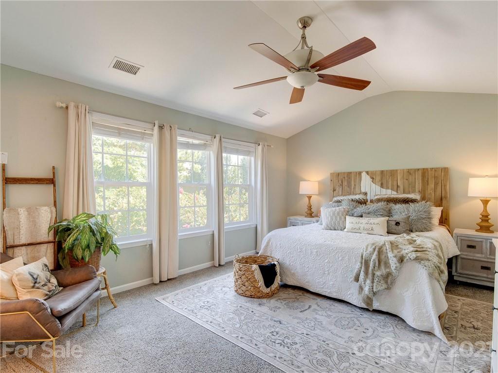 2405 Coltsgate Road Waxhaw, NC 28173 - Photo 30 of 48 a bedroom with a bed and a large window