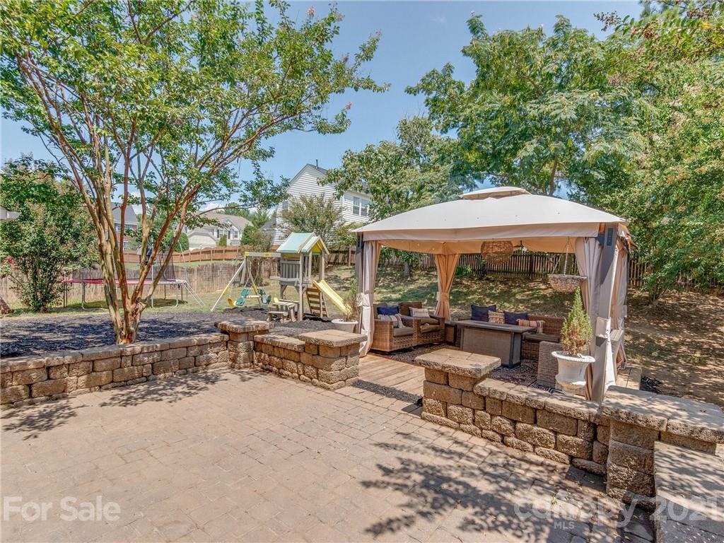 2405 Coltsgate Road Waxhaw, NC 28173 - Photo 44 of 48 a garden view with a seating space