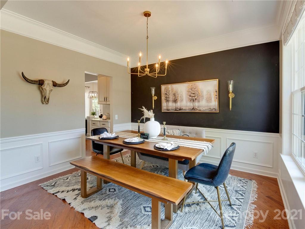 2405 Coltsgate Road Waxhaw, NC 28173 - Photo 7 of 48 a view of a dining room with furniture