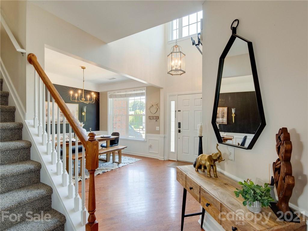2405 Coltsgate Road Waxhaw, NC 28173 - Photo 10 of 48 a view of entryway with wooden floor and windows