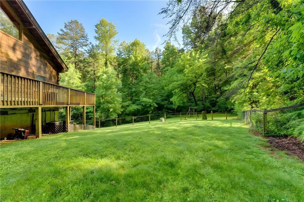 82 Walnut Grove Lane Tiger, GA 30576 - Photo 65 of 88 a view of a backyard with a garden
