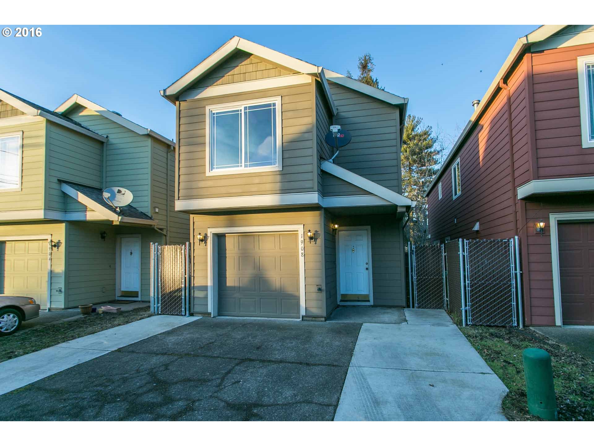 1908 Southeast 122nd Avenue Portland, OR 97233 - Photo 1 of 11 a view of a house and a yard