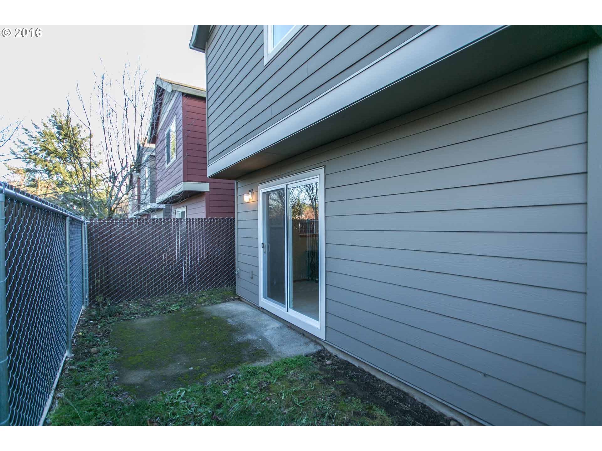 1908 Southeast 122nd Avenue Portland, OR 97233 - Photo 10 of 11 a view of backyard of house
