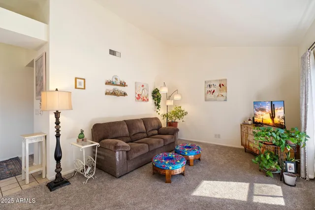a bedroom with furniture and a couch