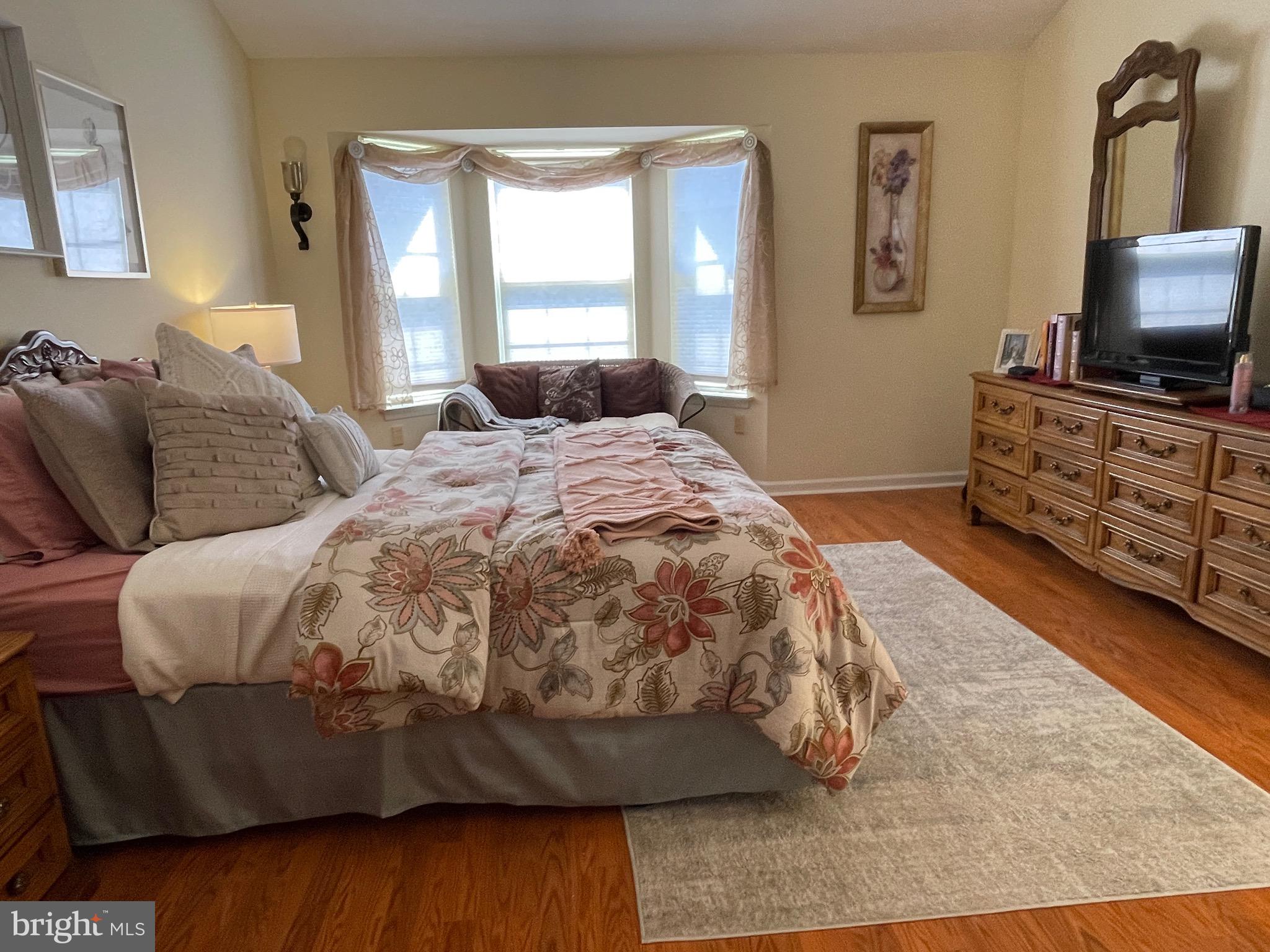 404 Fairview Way New Hope, PA 18938 - Photo 17 of 27 a bedroom with a bed and flat screen tv