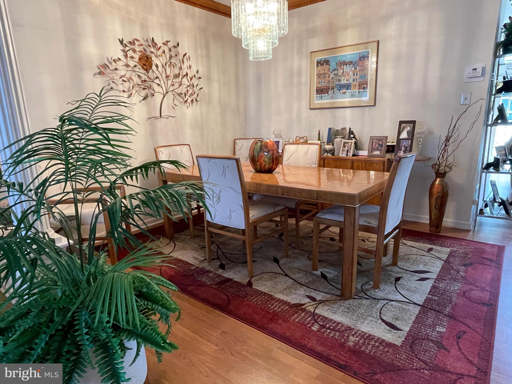 404 Fairview Way New Hope, PA 18938 - Photo 6 of 27 a dining room with furniture a rug and wooden floor