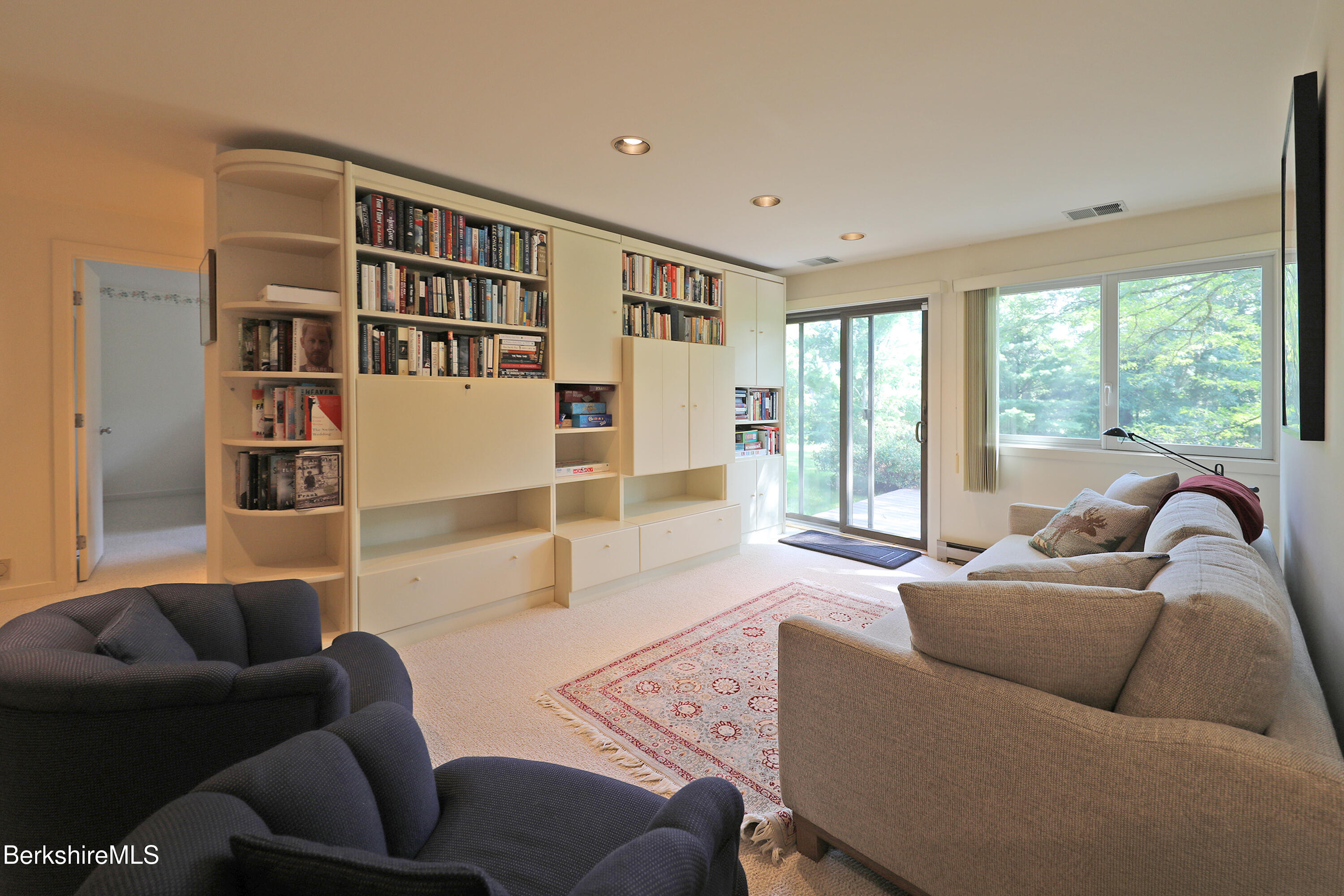 19 Hawthorne Road, Unit CV 7A Stockbridge, MA 01262 - Photo 44 of 64 FAMILY ROOM WALL OF BUILT-INS