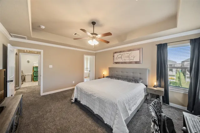 an aerial view of a house with a swimming pool