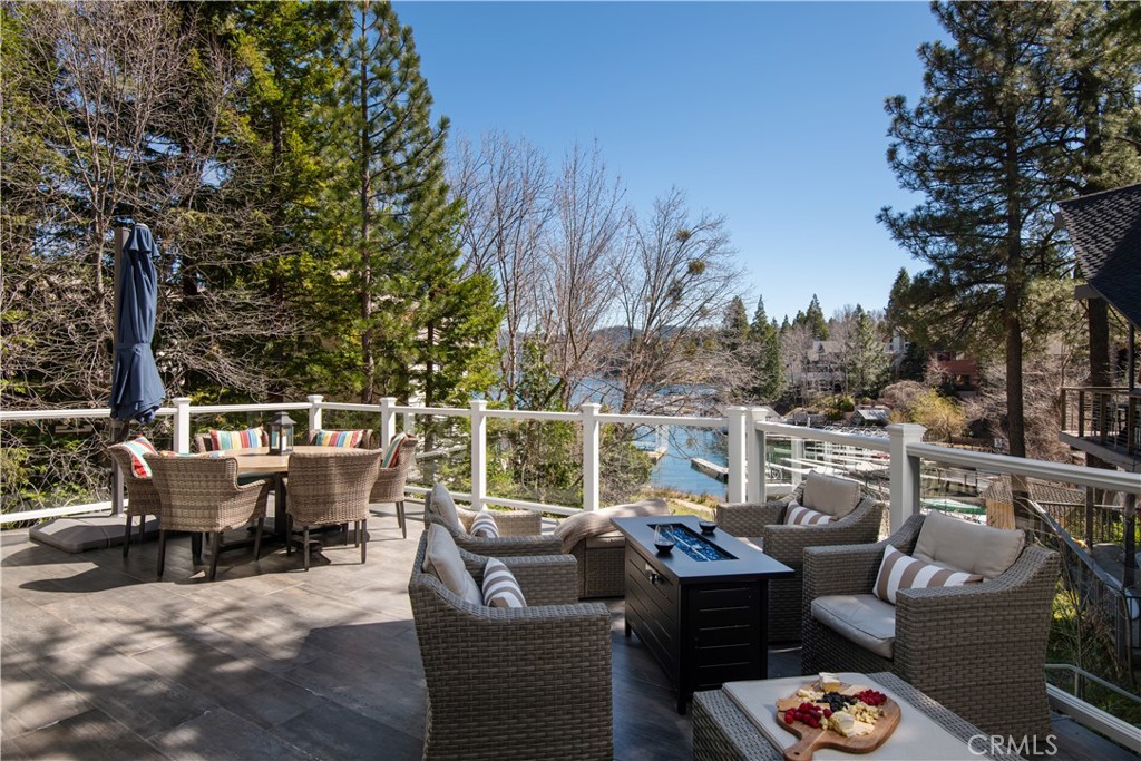 a view of roof deck with furniture