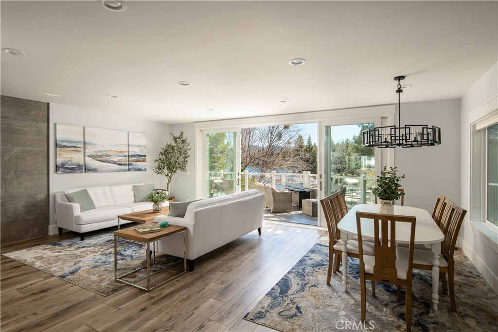 27589 West Shore Road Lake Arrowhead, CA 92352 - Photo 7 of 11 a living room with furniture and a large window