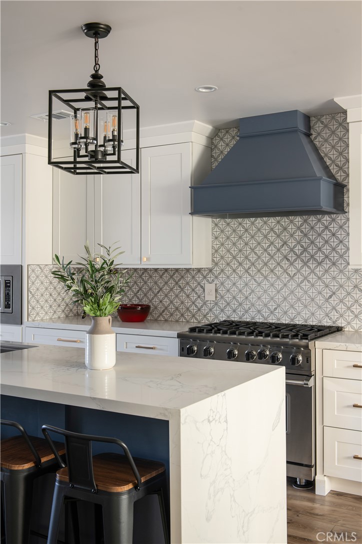 27589 West Shore Road Lake Arrowhead, CA 92352 - Photo 8 of 11 a kitchen with a sink a stove and cabinets