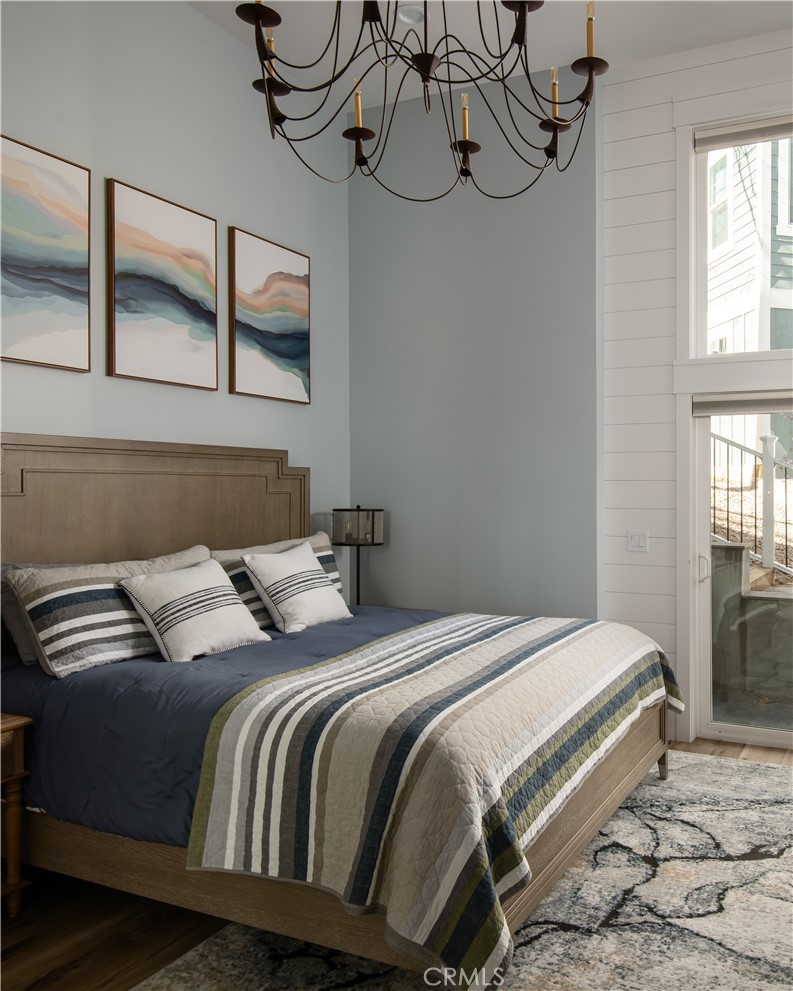 27589 West Shore Road Lake Arrowhead, CA 92352 - Photo 9 of 11 a bedroom with a bed and window