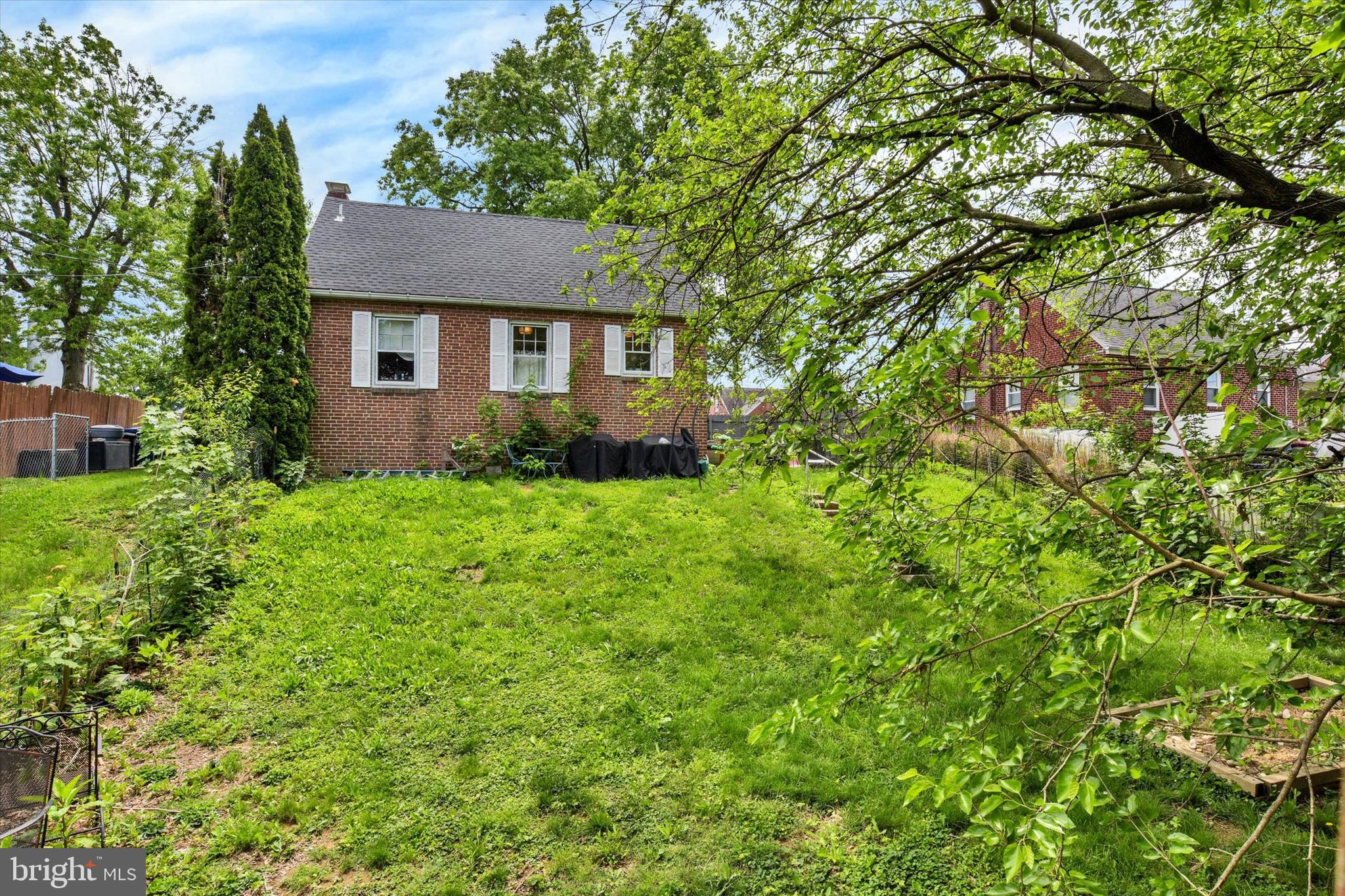 4712 Ruth Ann Street Harrisburg, PA 17109 - Photo 21 of 26 a view of a house with yard and a tree