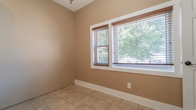 a view of a room that has a window in it