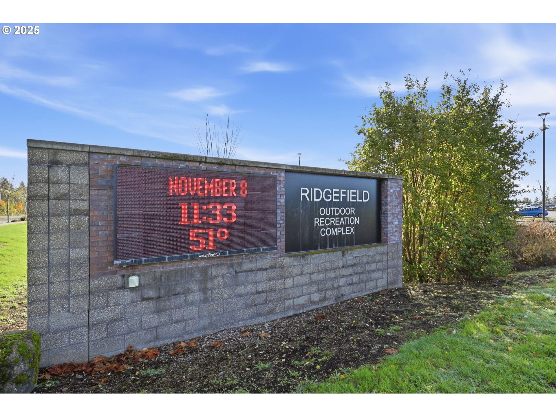 117 North 9th Avenue Ridgefield, WA 98642 - Photo 37 of 47 a view of outdoor space with signage and flags
