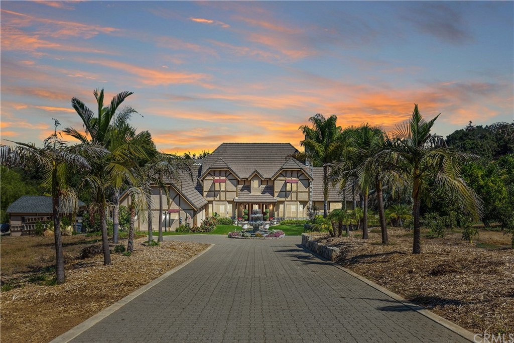a view of multiple houses with a street