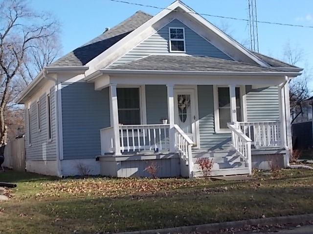 10 Kitchell Street Pana, IL 62557 - Photo 1 of 1 a front view of a house with a yard
