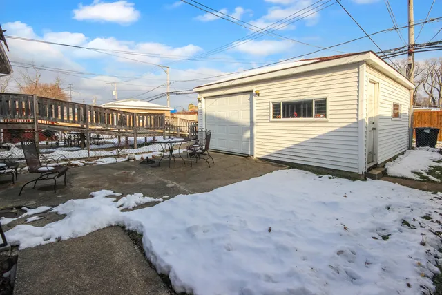 a view of a terrace with wooden walls