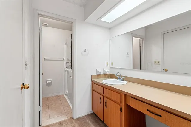 a view of a room with a large window