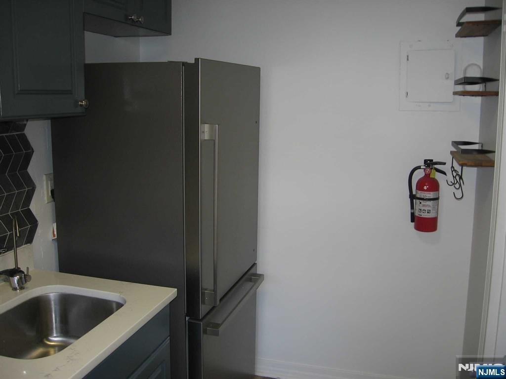 67 Clark Court Rutherford, NJ 07070 - Photo 12 of 12 a view of storage and utility room with washer and dryer