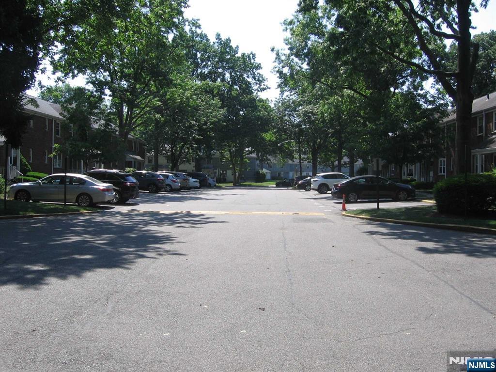 67 Clark Court Rutherford, NJ 07070 - Photo 3 of 12 a row of cars parked in a parking lot
