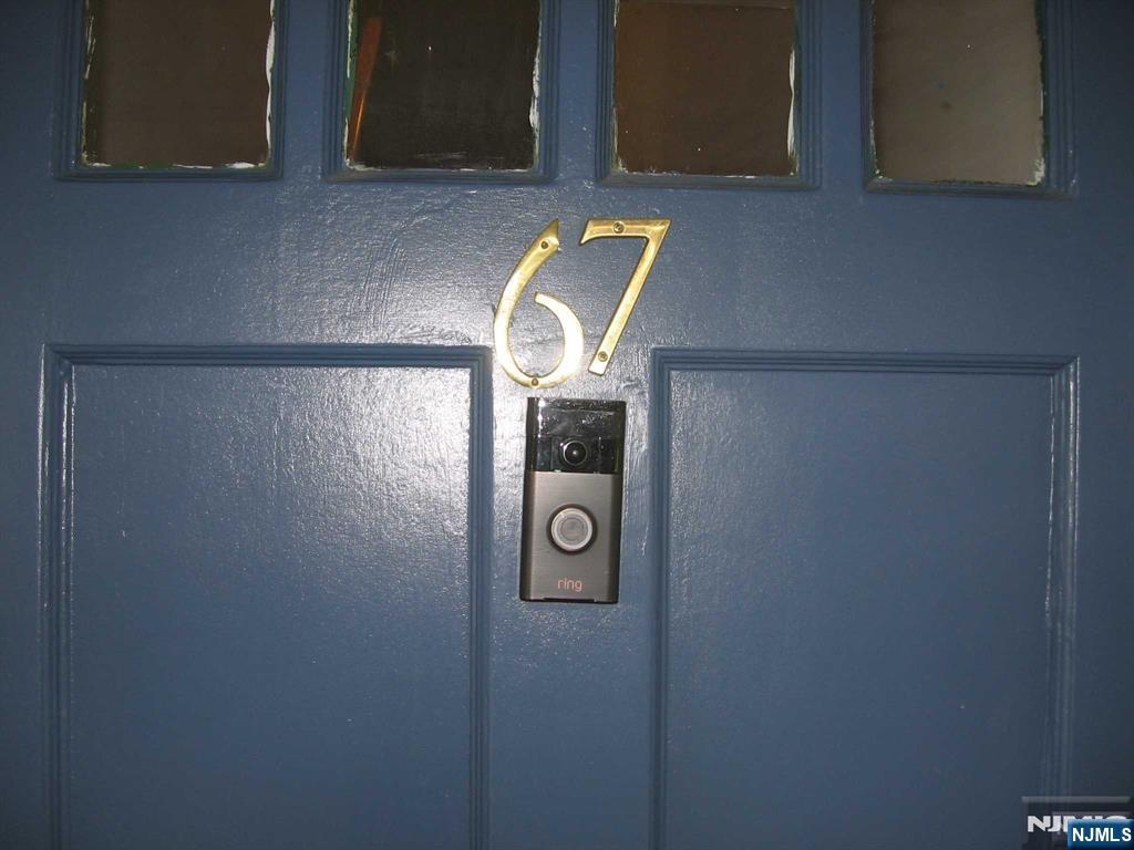 67 Clark Court Rutherford, NJ 07070 - Photo 4 of 12 a bathroom with a mirror
