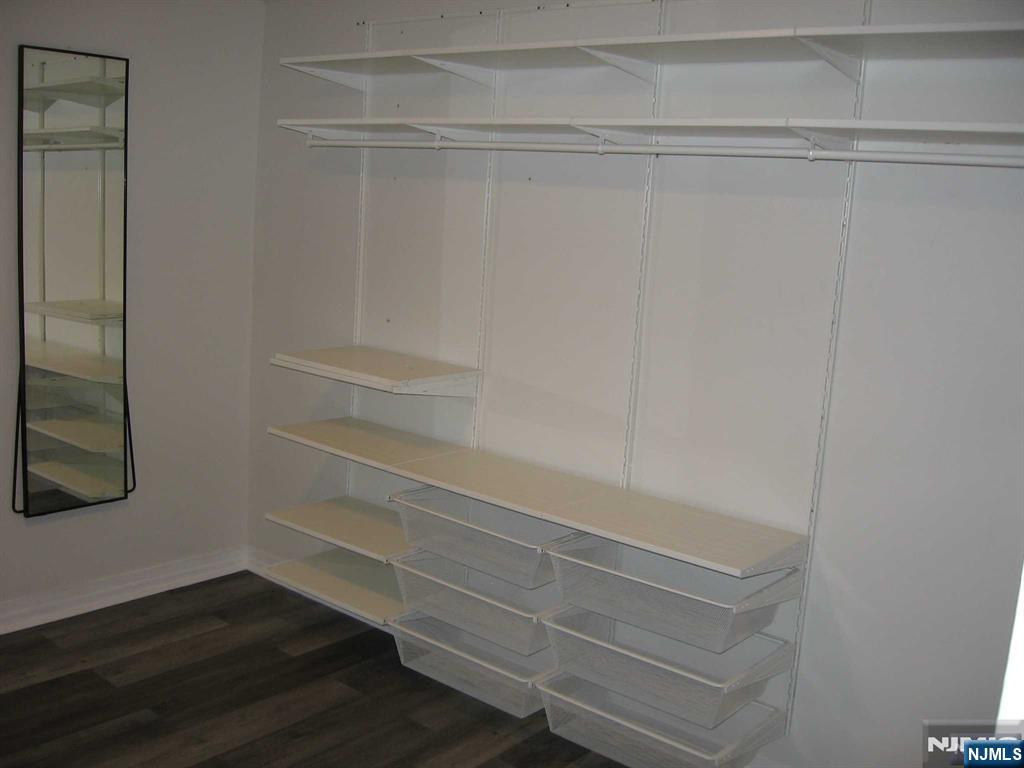 67 Clark Court Rutherford, NJ 07070 - Photo 7 of 12 a view of walk in closet with empty racks