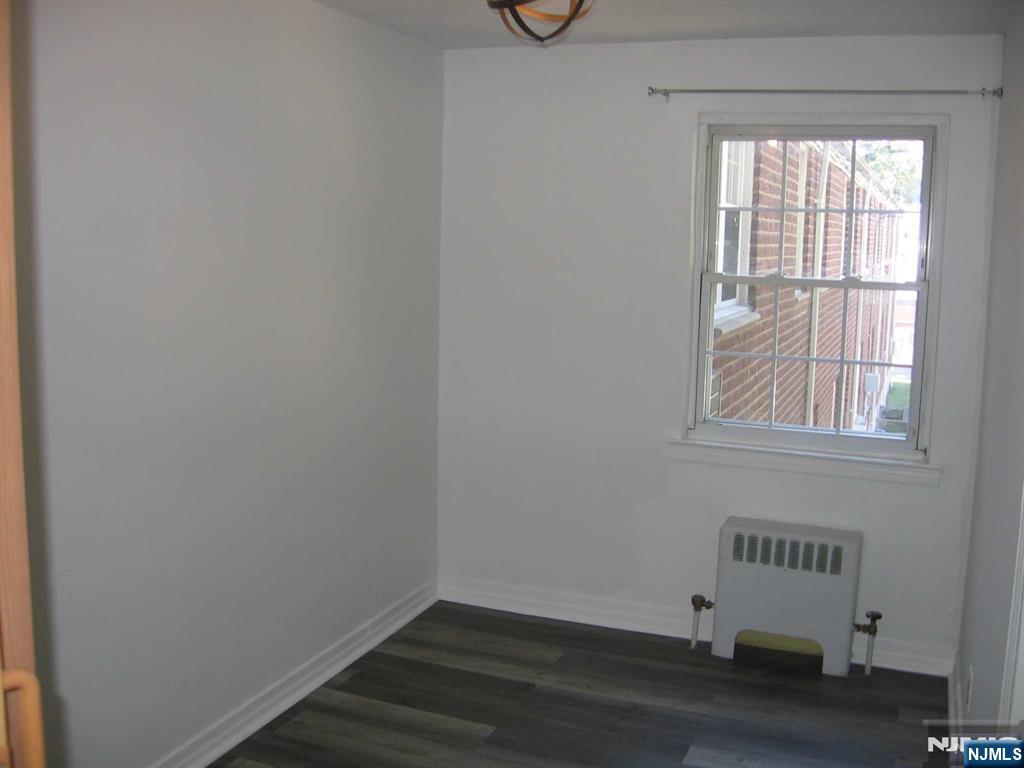 67 Clark Court Rutherford, NJ 07070 - Photo 10 of 12 an empty room with a window