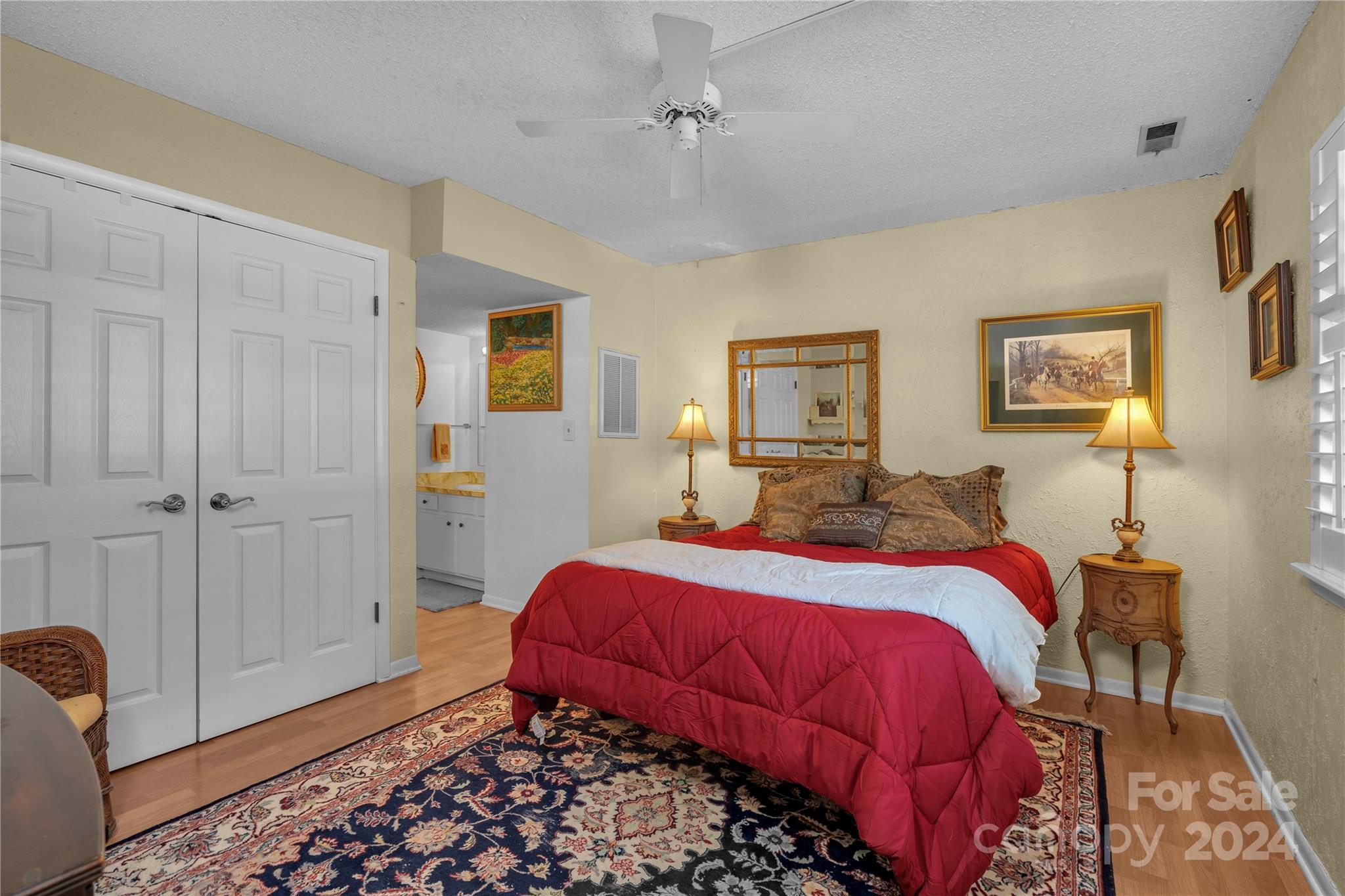 300 Gray Drive Charlotte, NC 28213 - Photo 13 of 40 a bedroom with a bed and a lamp