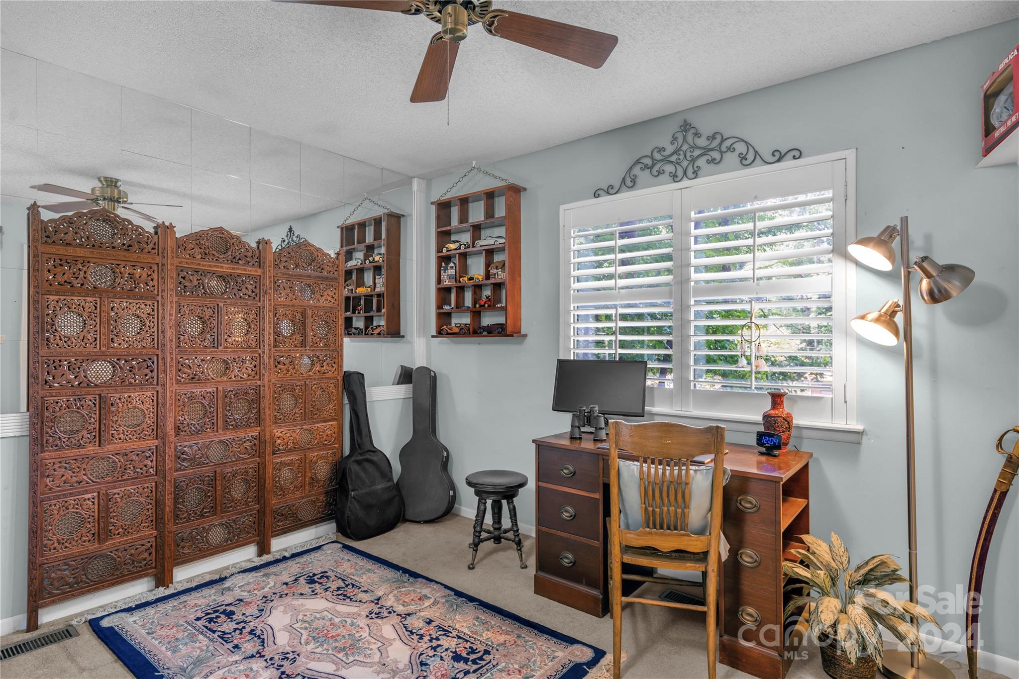 300 Gray Drive Charlotte, NC 28213 - Photo 16 of 40 a view of a workspace with furniture and a window