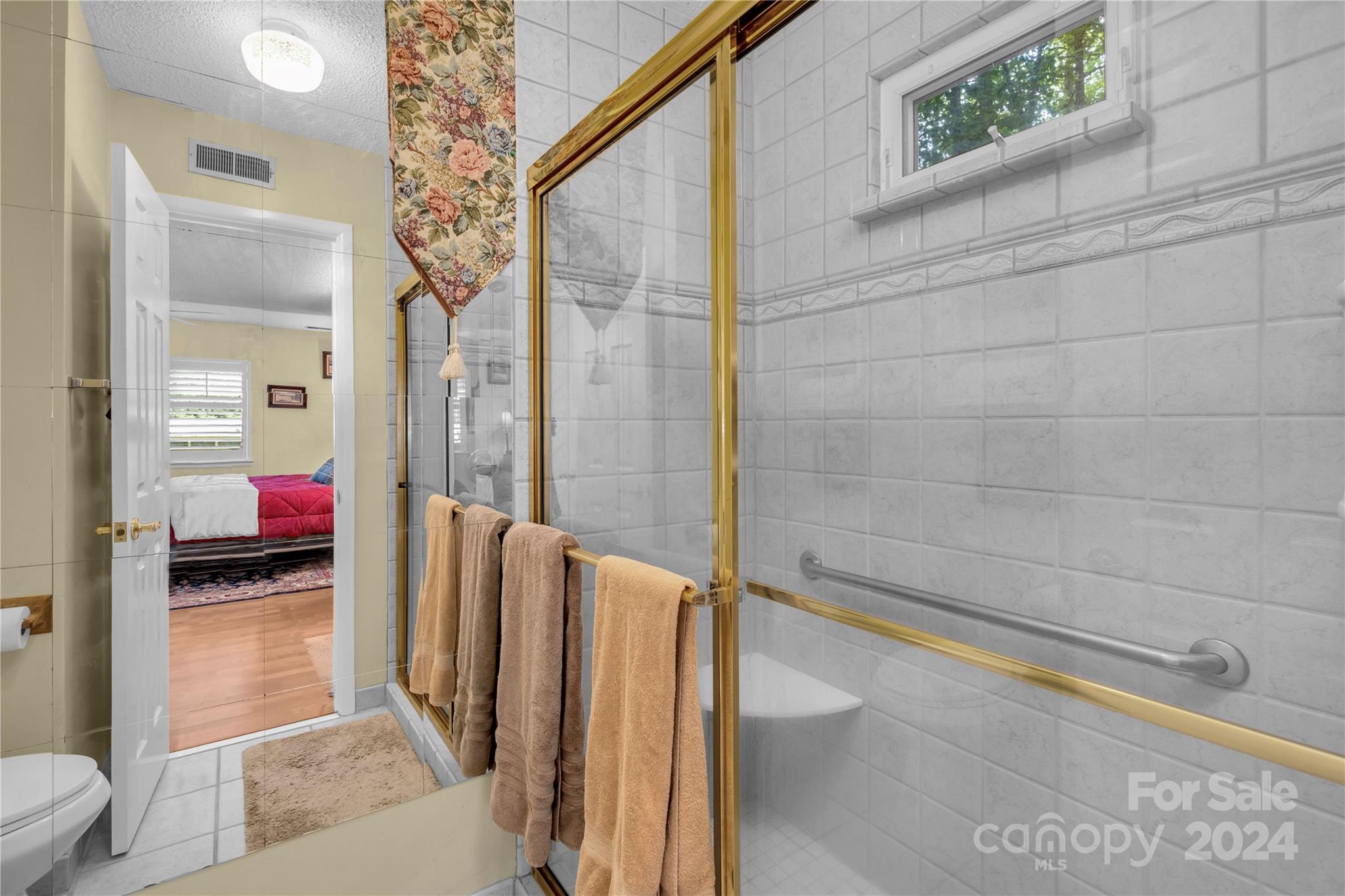300 Gray Drive Charlotte, NC 28213 - Photo 17 of 40 a bathroom with a sink and a mirror
