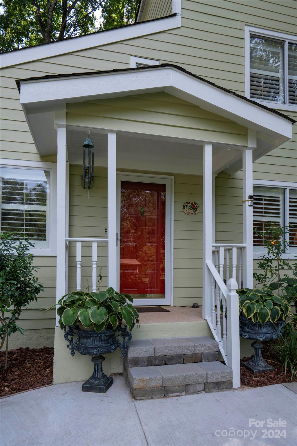 300 Gray Drive Charlotte, NC 28213 - Photo 26 of 40 a front view of a house with entryway