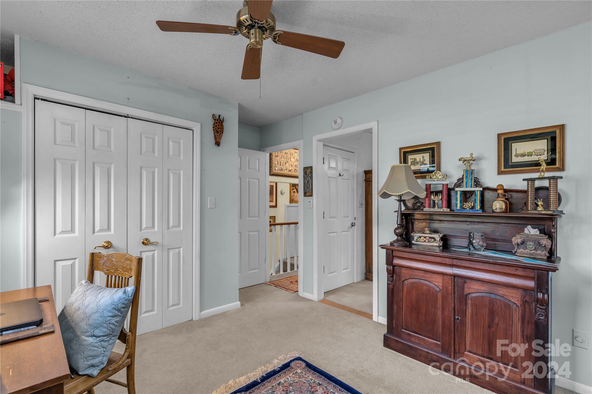 300 Gray Drive Charlotte, NC 28213 - Photo 28 of 40 a living room with furniture and a flat screen tv