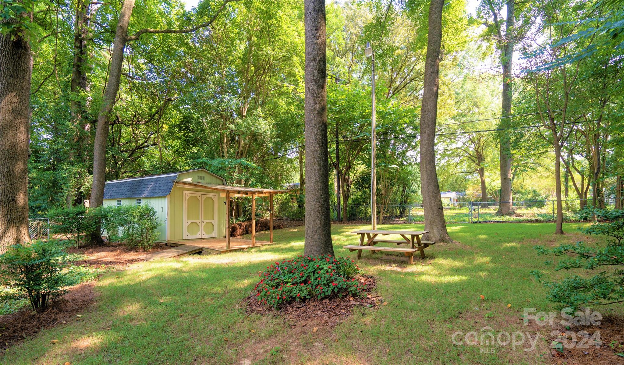 300 Gray Drive Charlotte, NC 28213 - Photo 3 of 40 a view of a house with backyard and sitting area