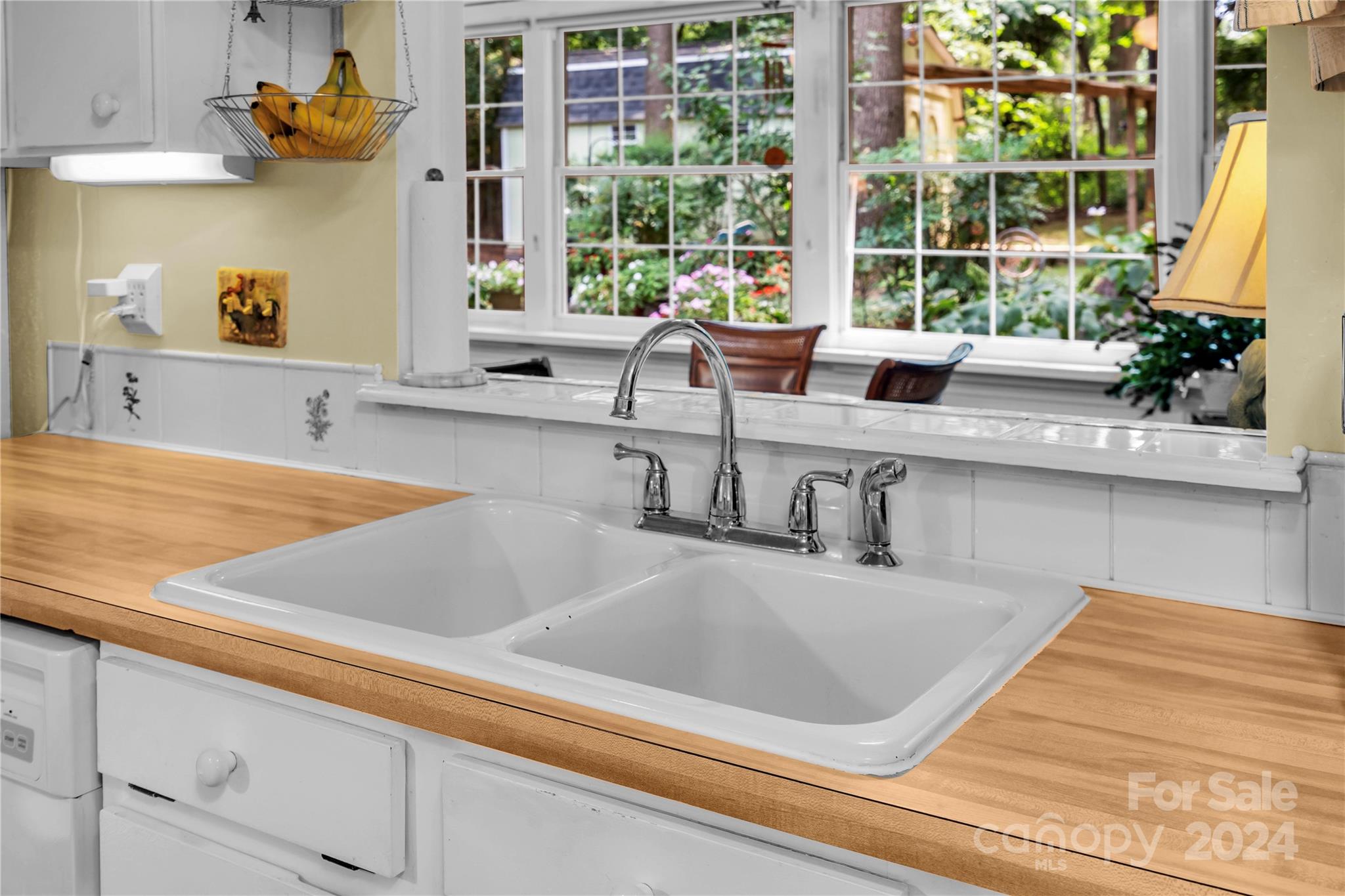 300 Gray Drive Charlotte, NC 28213 - Photo 33 of 40 a kitchen with a sink and a large window