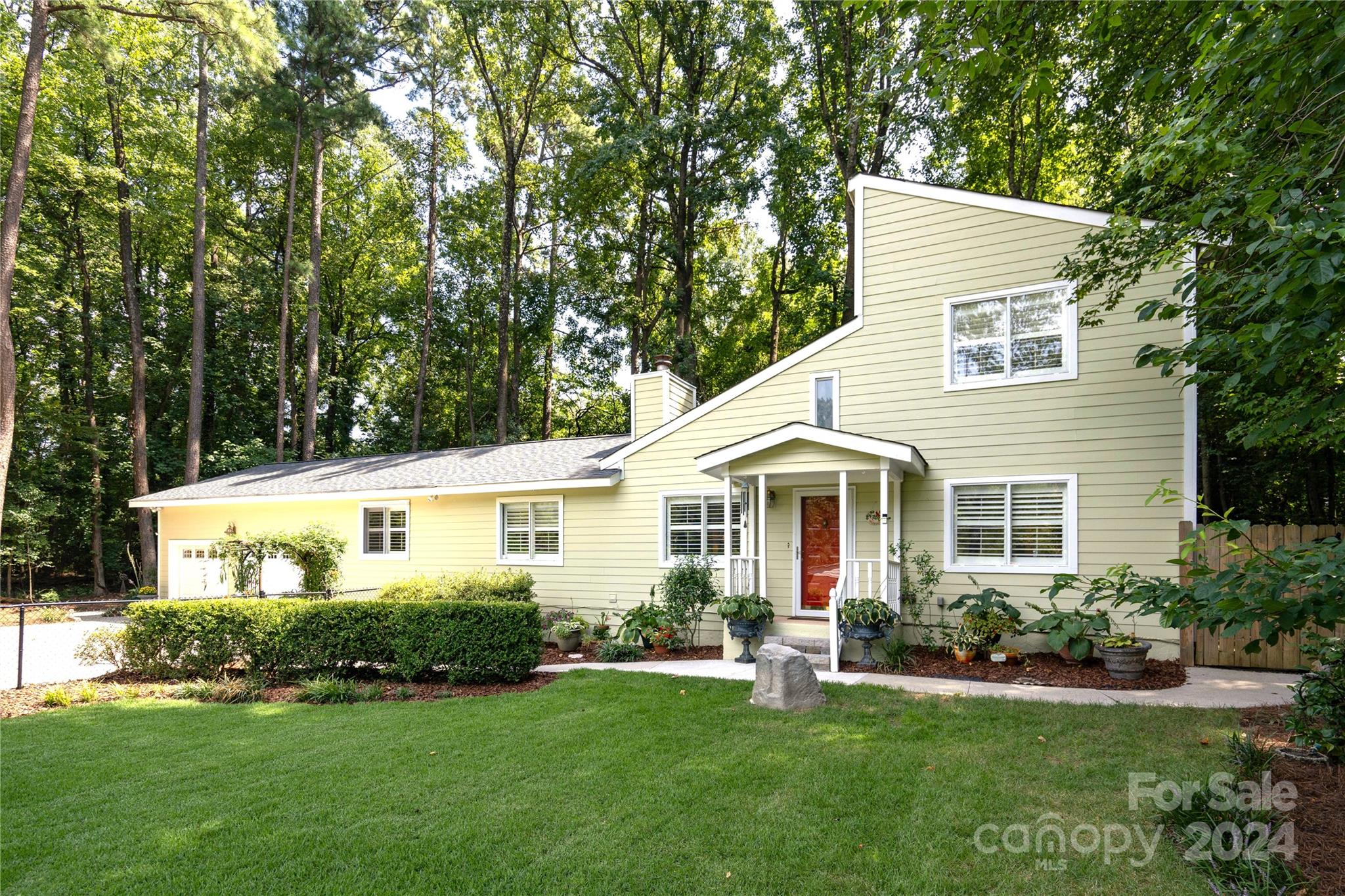 300 Gray Drive Charlotte, NC 28213 - Photo 40 of 40 a front view of a house with a yard and trees