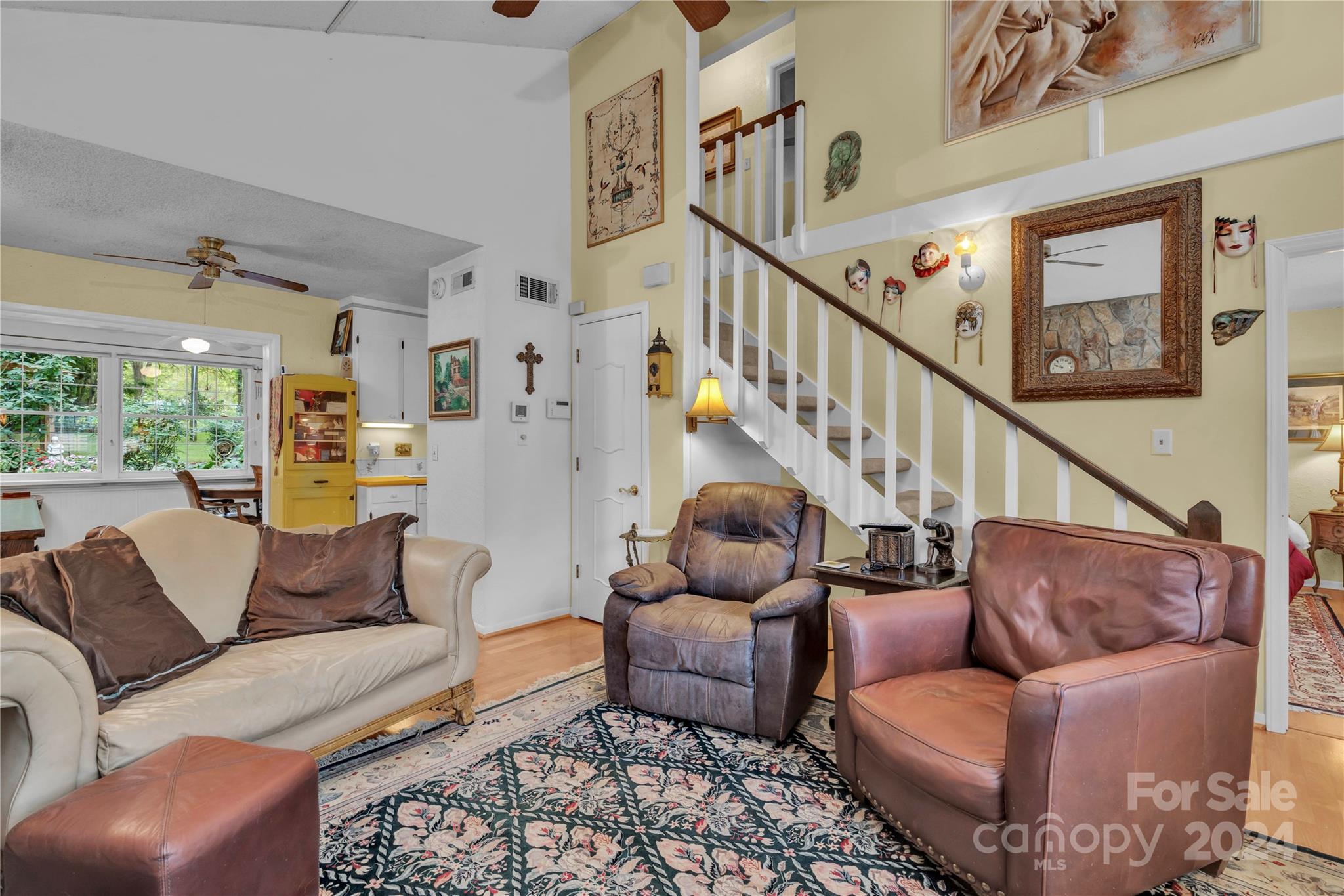 300 Gray Drive Charlotte, NC 28213 - Photo 5 of 40 a living room with furniture ceiling fan and a rug