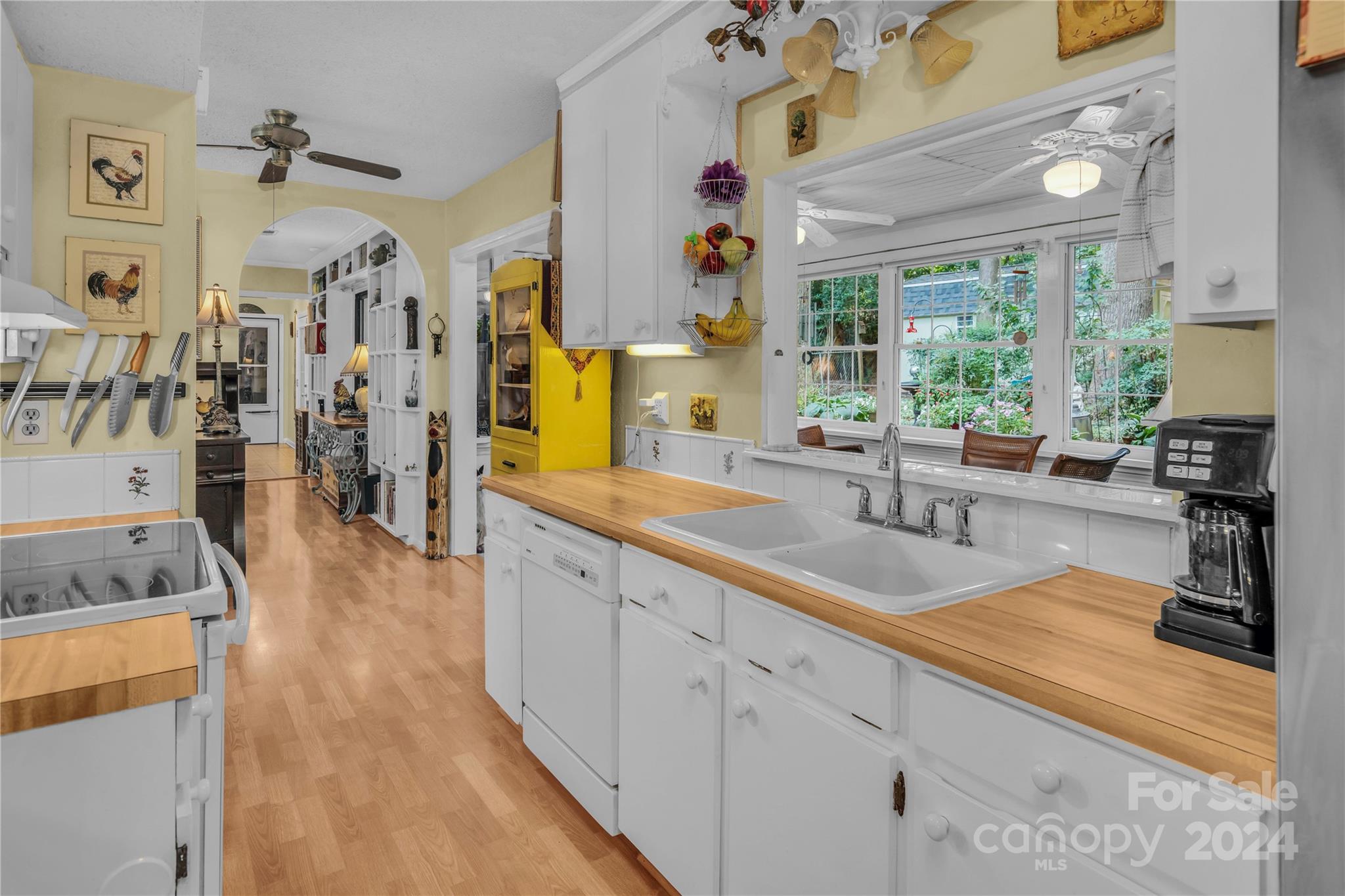 300 Gray Drive Charlotte, NC 28213 - Photo 8 of 40 a kitchen with stainless steel appliances granite countertop sink stove top oven and cabinets