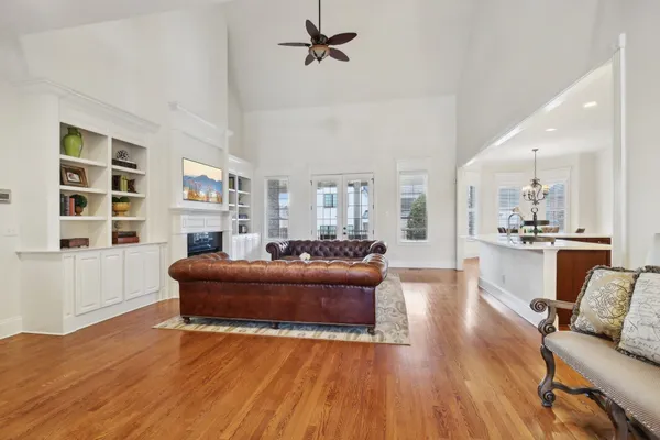 a living room with furniture or couch and a fireplace