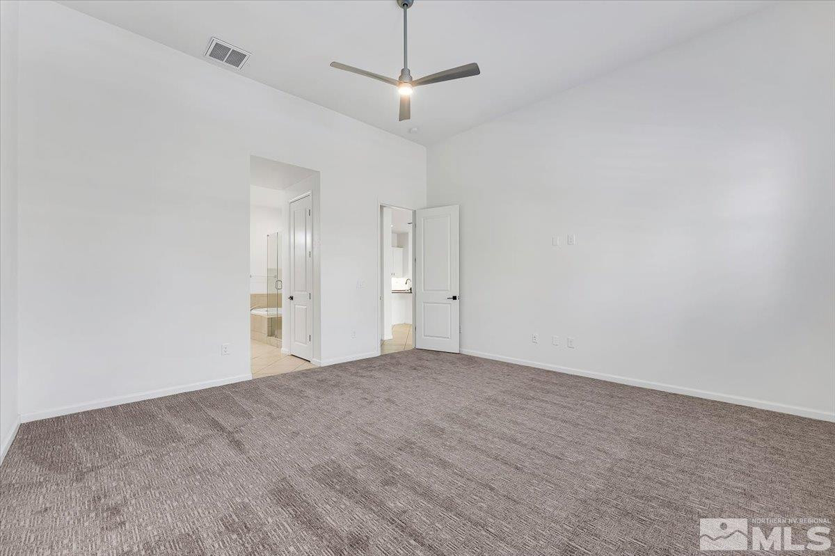 9405 Baldacci Road Reno, NV 89521 - Photo 13 of 40 a view of an empty room with a window