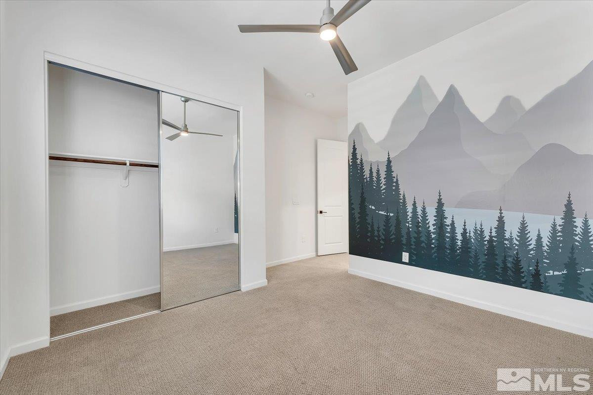9405 Baldacci Road Reno, NV 89521 - Photo 23 of 40 a view of a big room with a chandelier fan