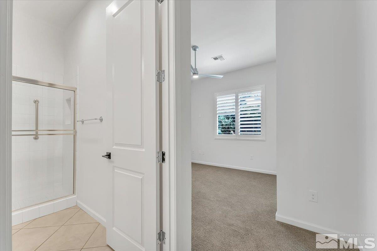 9405 Baldacci Road Reno, NV 89521 - Photo 24 of 40 a view of hallway with windows