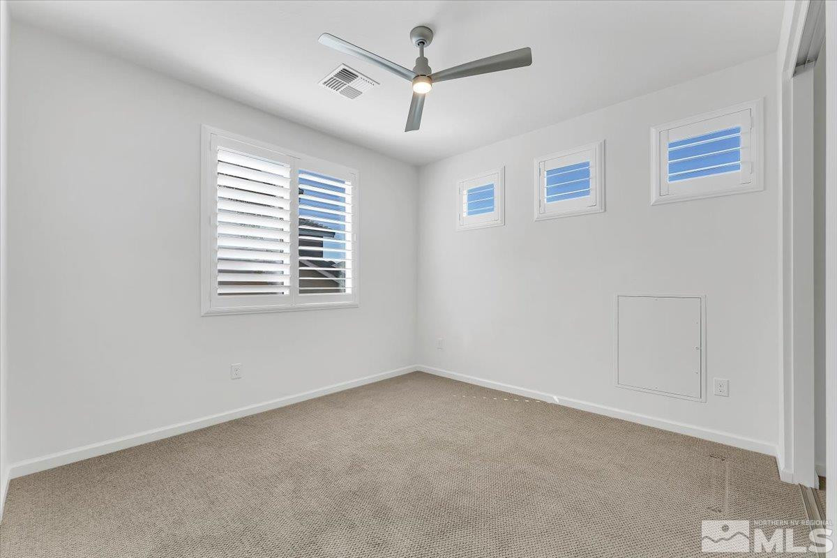 9405 Baldacci Road Reno, NV 89521 - Photo 25 of 40 a view of an empty room with a window