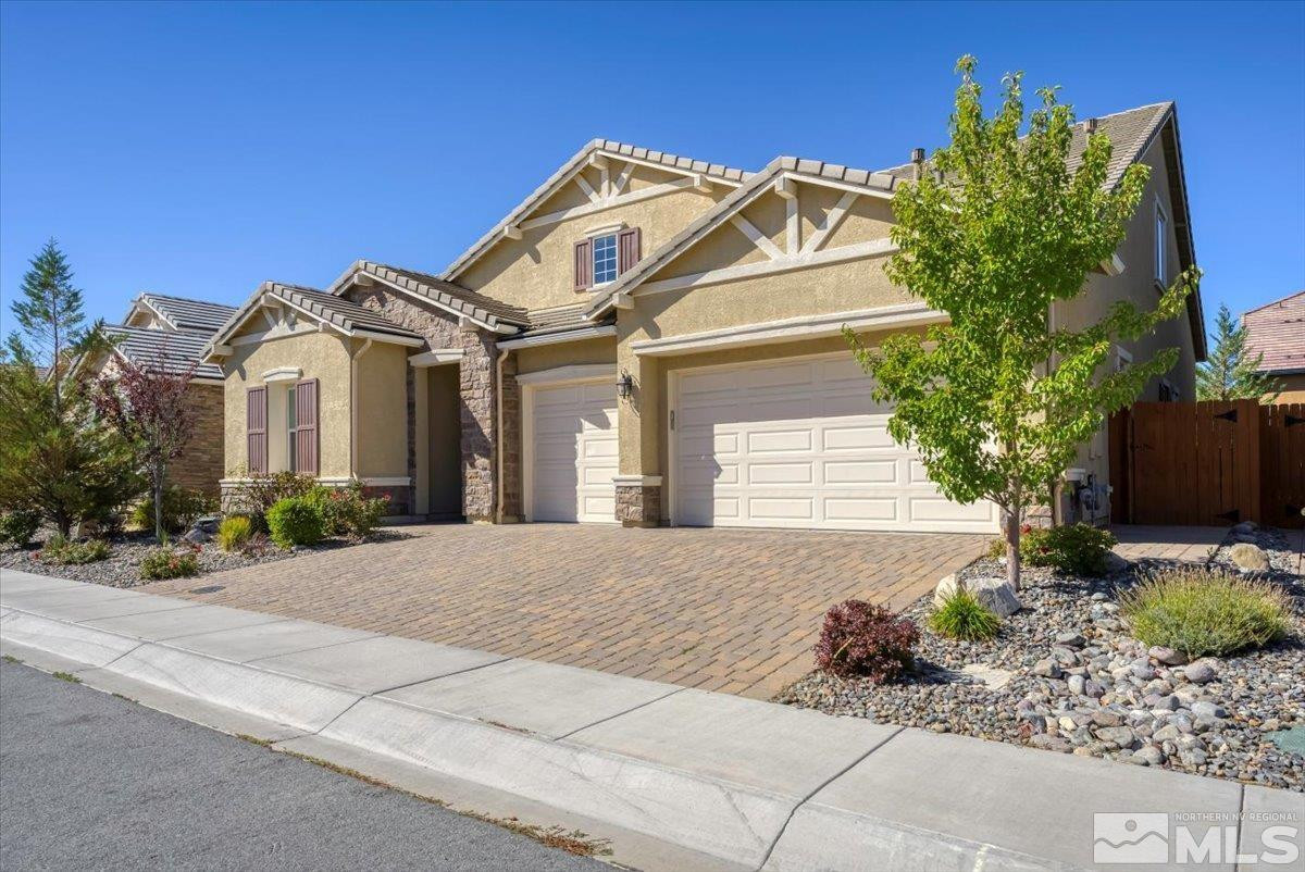 9405 Baldacci Road Reno, NV 89521 - Photo 29 of 40 a front view of a house with a garden