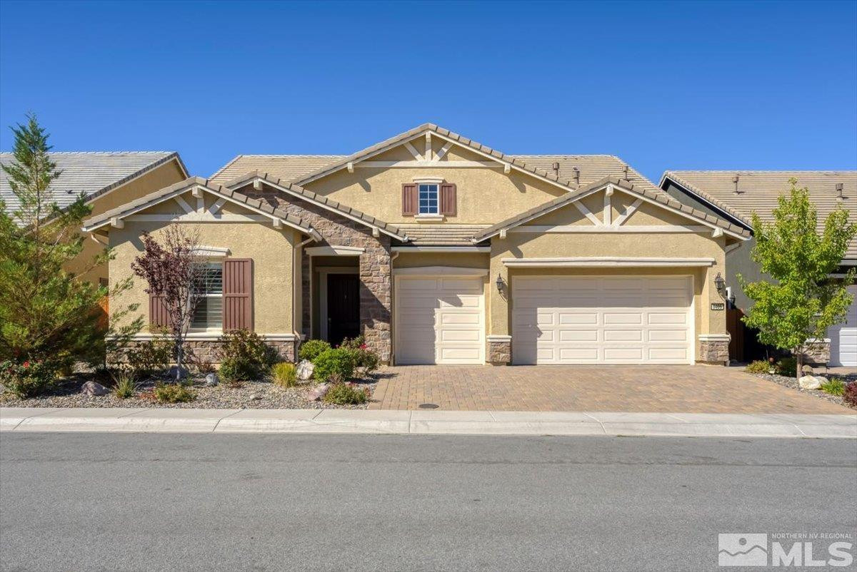 9405 Baldacci Road Reno, NV 89521 - Photo 6 of 40 a front view of a house with a yard
