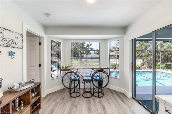 a view of a livingroom with furniture and window