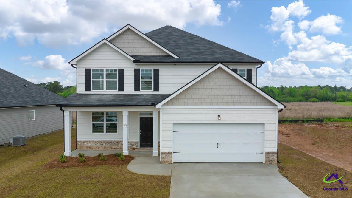 227 Cattle Drive Perry, GA 31069 - Photo 1 of 40 a view of a house with a yard