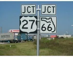 a sign that is on the wall of building