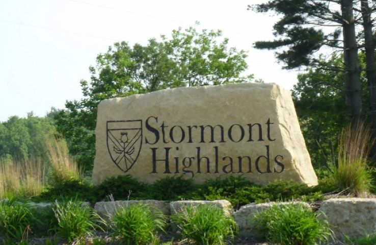 7811 Highland Drive Rockford, IL 61102 - Photo 1 of 1 a sign that is on the side of the tree